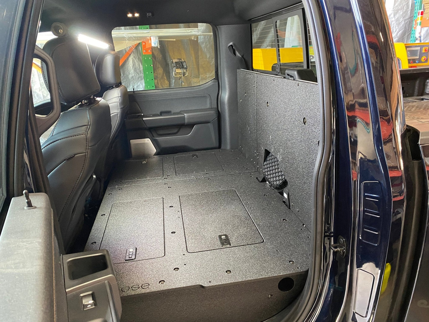 Ford Super Duty Ford - F250-F350 - 2023-Present - 5th Gen. Crew Cab - Second Row Seat Delete Plate System with Factory B&O Subwoofer Center Wall with Exterior Port