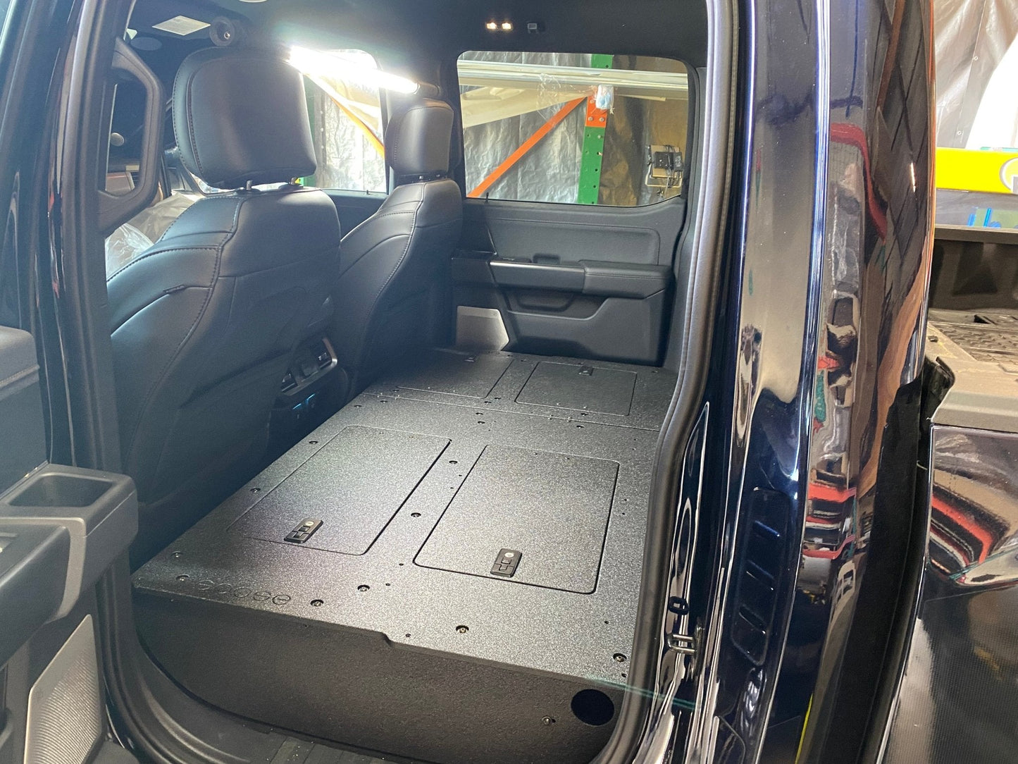 Ford Super Duty Ford - F250-F350 - 2023-Present - 5th Gen. Crew Cab - Second Row Seat Delete Plate System with Factory B&O Subwoofer Center Wall with Exterior Port